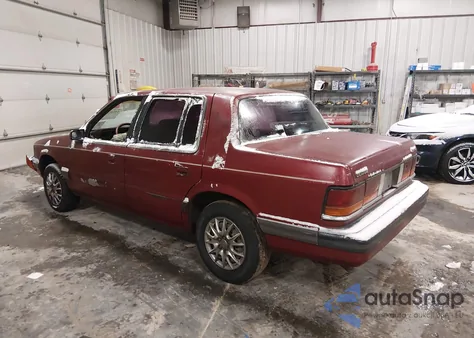 1990 Dodge Spirit z USA, uszkodzony, nr VIN 1B3XA46K0LF742798